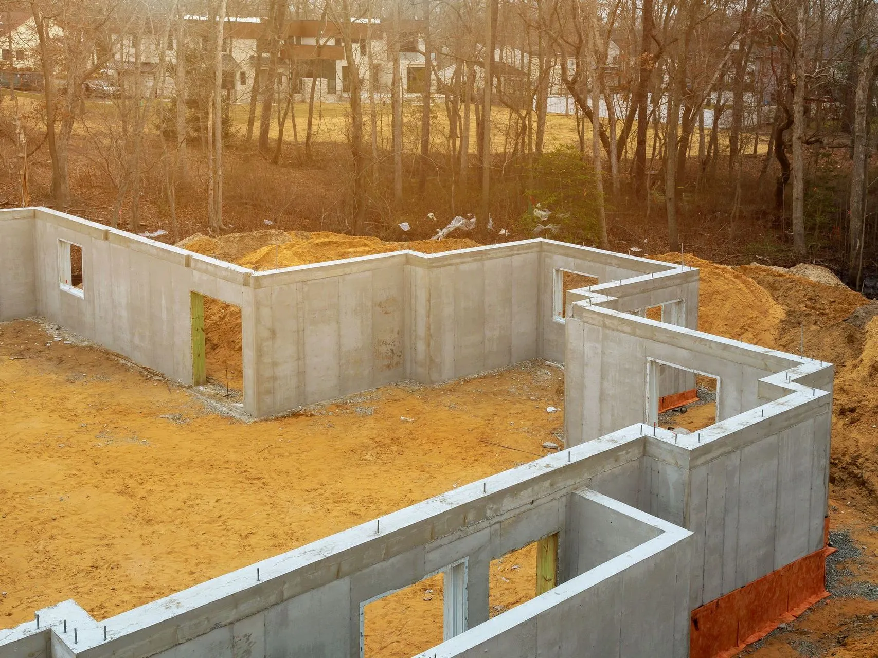 cross-section of a waterproofed basement in an Akron home, highlighting protection against moisture and water damage